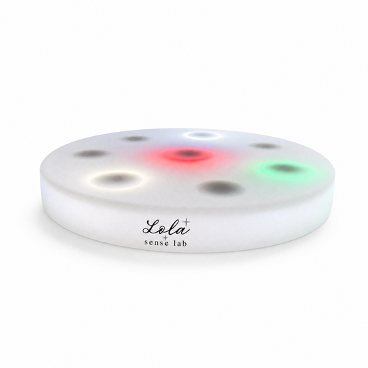 Interactive LED Sensory Board with illuminated touch points on a white background